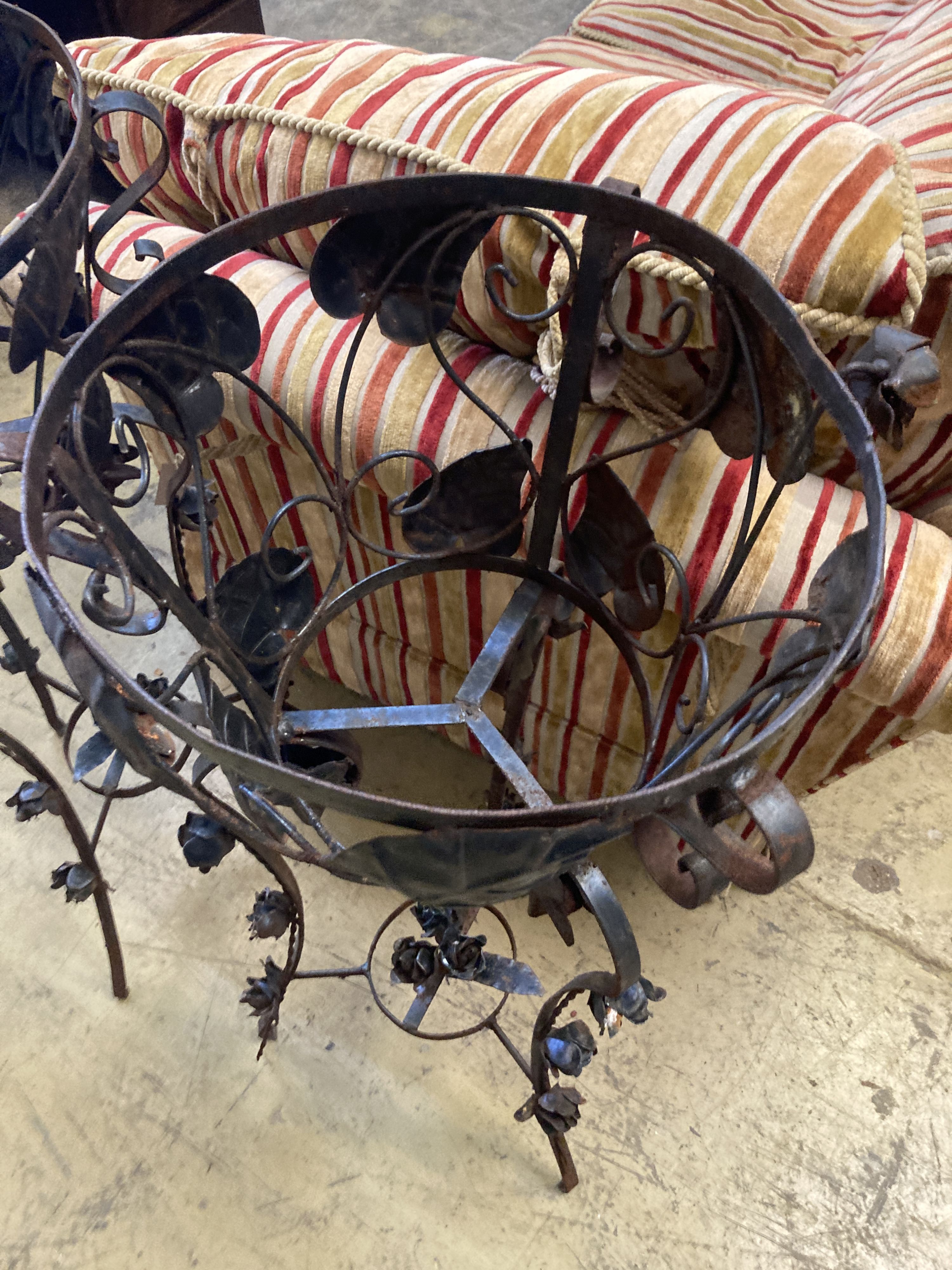 A pair of mid 20th century French wrought iron circular jardiniere stands, 42cm diameter, height 97cm